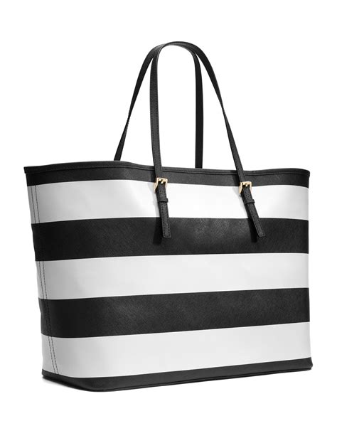 michael kors white striped bag|Michael Kors white floral bag.